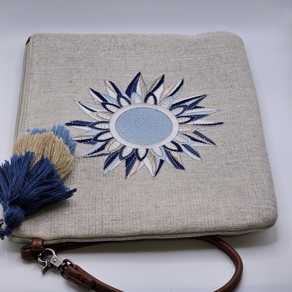 Sakroots Beige and Blue Clutch with Embroidered Sunburst